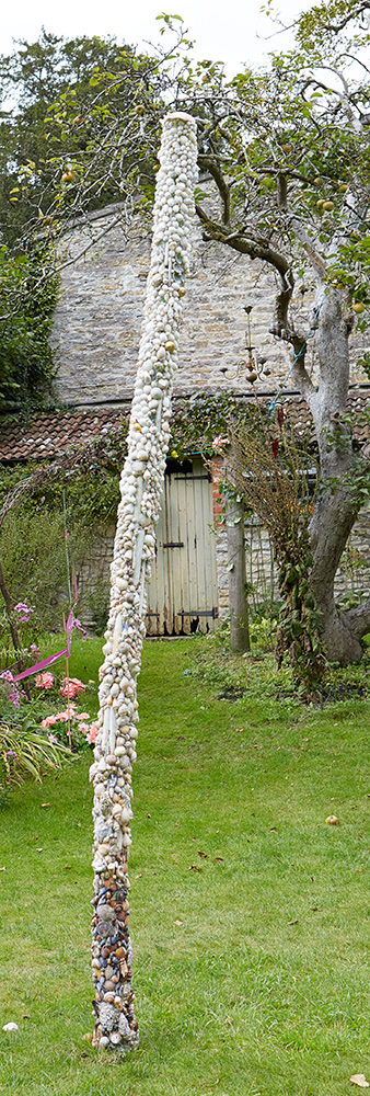 lavishly mosaicked shell obelisk