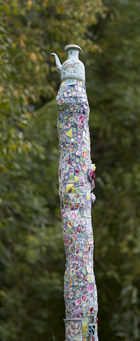 totem of ceramic fragments with teapot on top