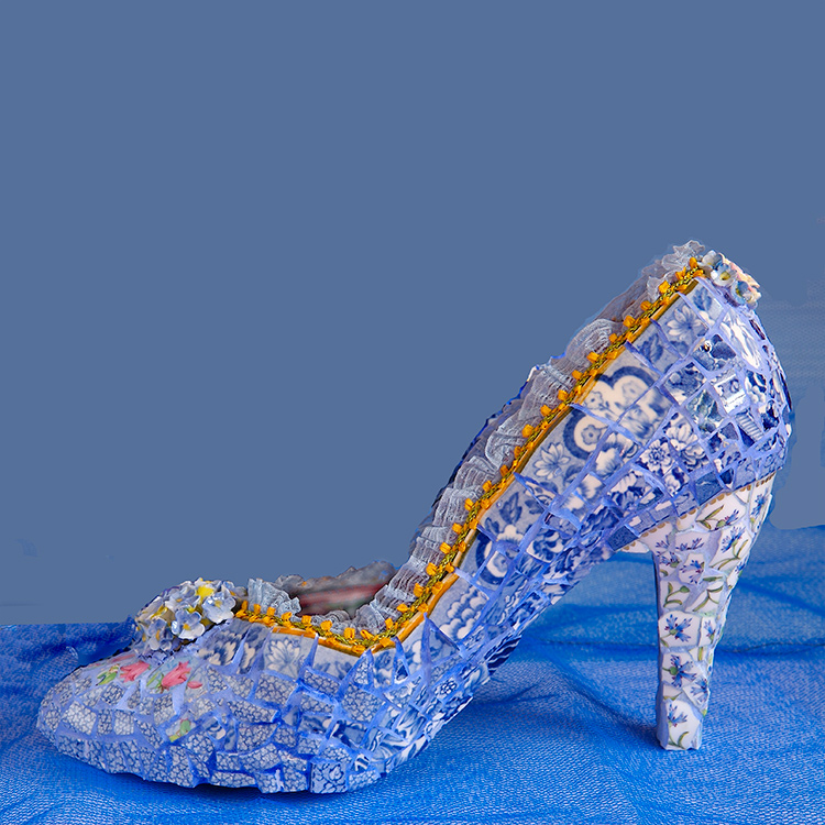 blue mosaic shoe with yellow trim