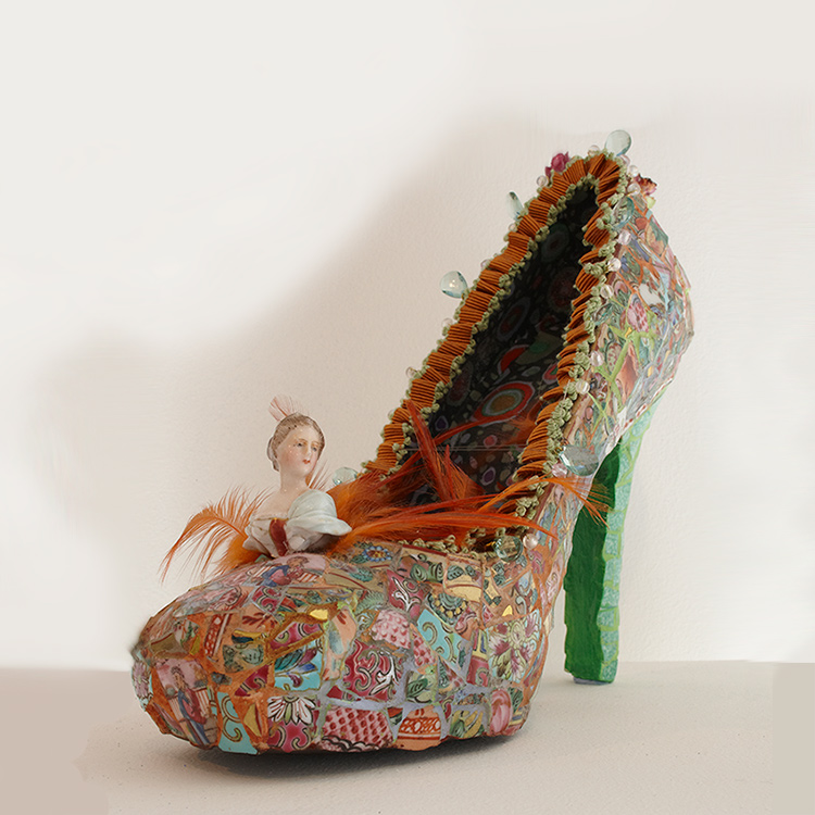 mosaic shoe with statue